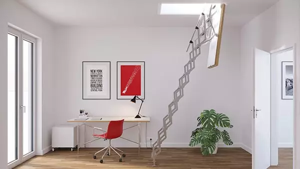 Flat roof hatch and loft ladder placed in an office with a desk and a green plant